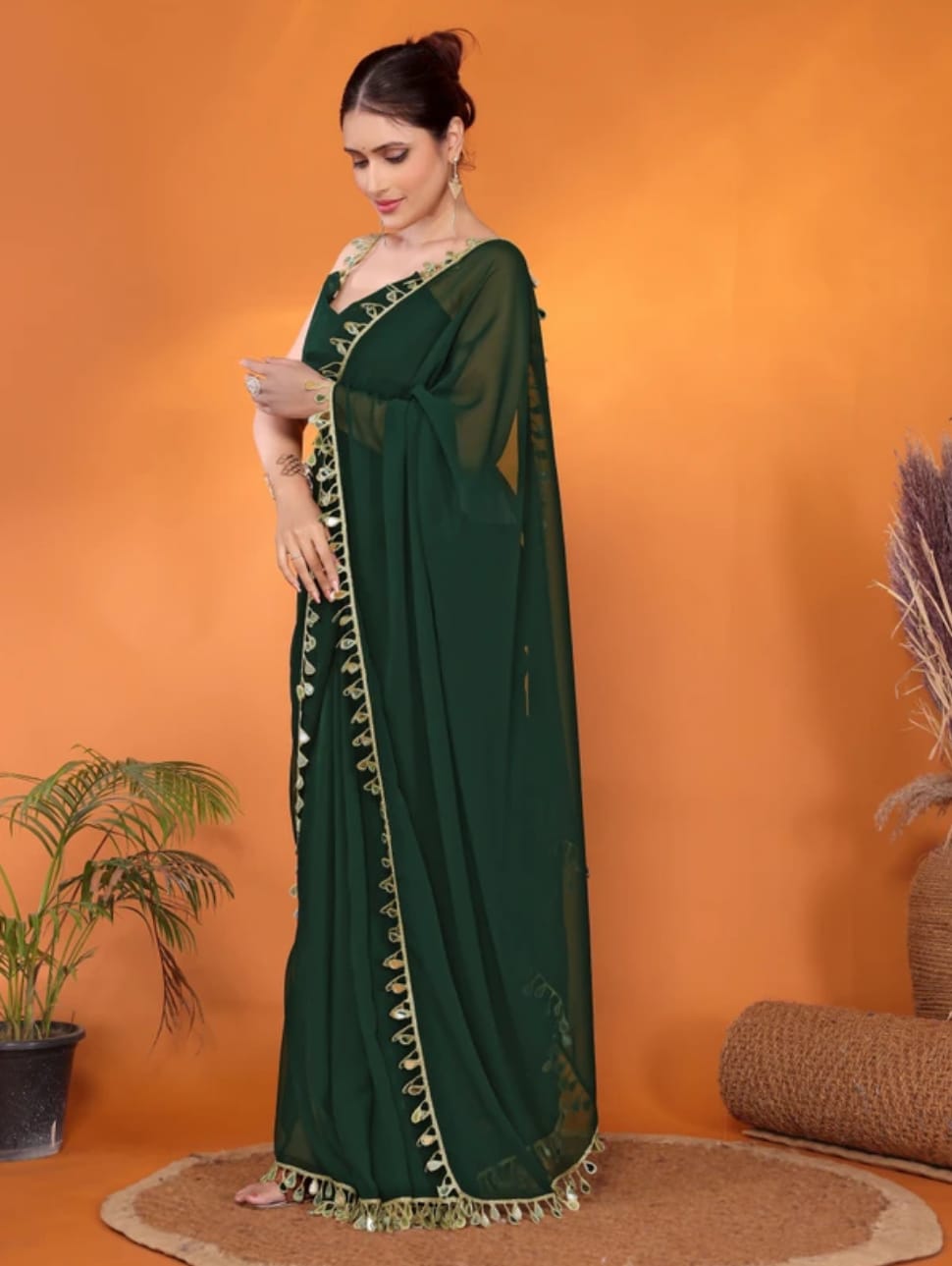 Elegant Party Wear Green Georgette Saree